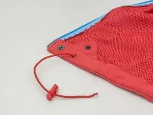 How do I replace a cord stopper on my Vaude jacket drawstring?