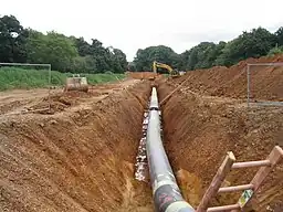 Barton Stacey to Lockerley pipeline having been welded and tested the pipes are now being buried in a deep trench.