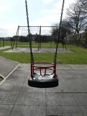 playground=swingbaby=yesStandard baby swing - bars are to stop baby escaping, not to provide postural support