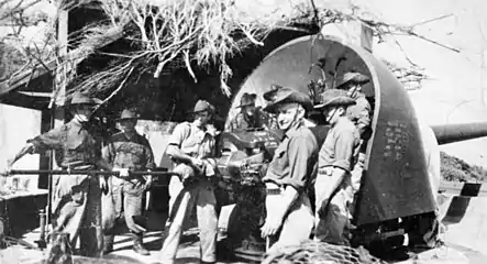 Fort Pearce, Port Phillip Heads Victoria. 6 inch gun crew from C Company 5th Battalion Volunteer Defence Corps prepare for action at training camp, April 1944.