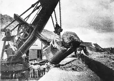 227b-Steam Shovel Handling a large boulder.jpg
