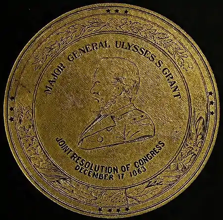 A gold seal with a profile drawing of Grant′s face and the words “MAJOR GENERAL ULYSSES S. GRANT” inscribed in a semi-circle above and “JOINT RESOLUTION OF CONGRESS / DECEMBER 17 1863” below